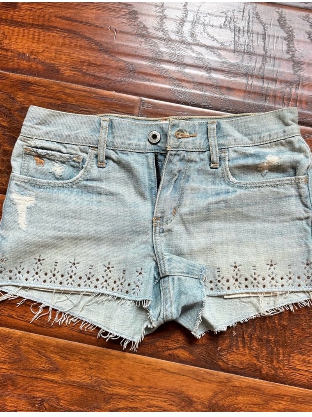abercrombie kids light blue denim eyelet cutoff shorts